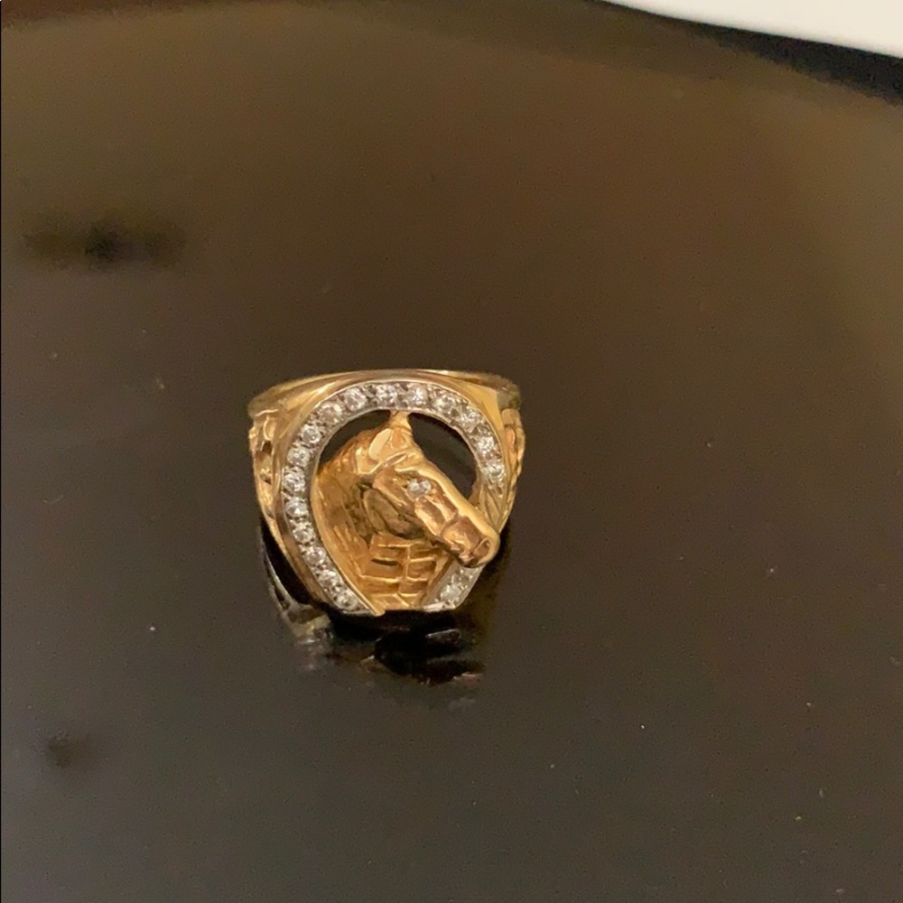Diamond and gold ring horses